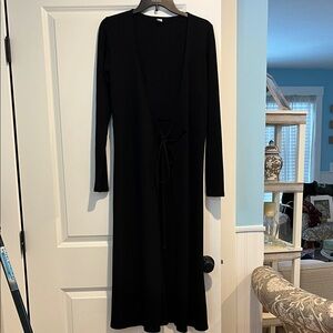 Elegant Black Long Sleeve Sweater size S, but runs to a size M